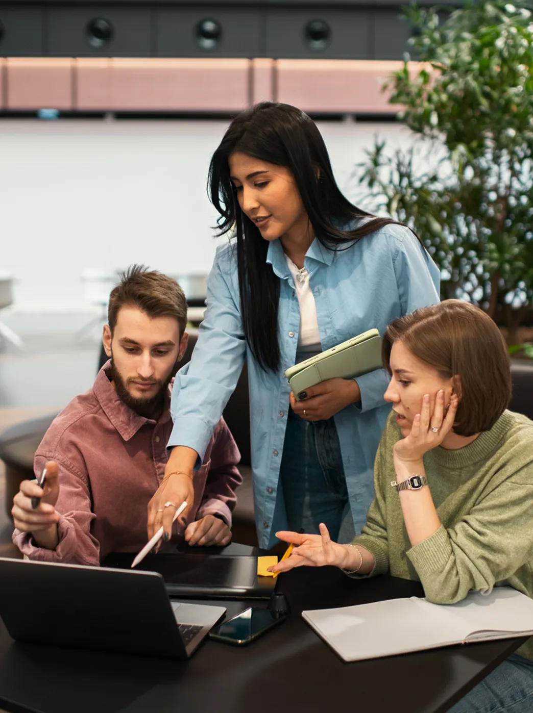 11x Solutions team collaborating with client on product updates